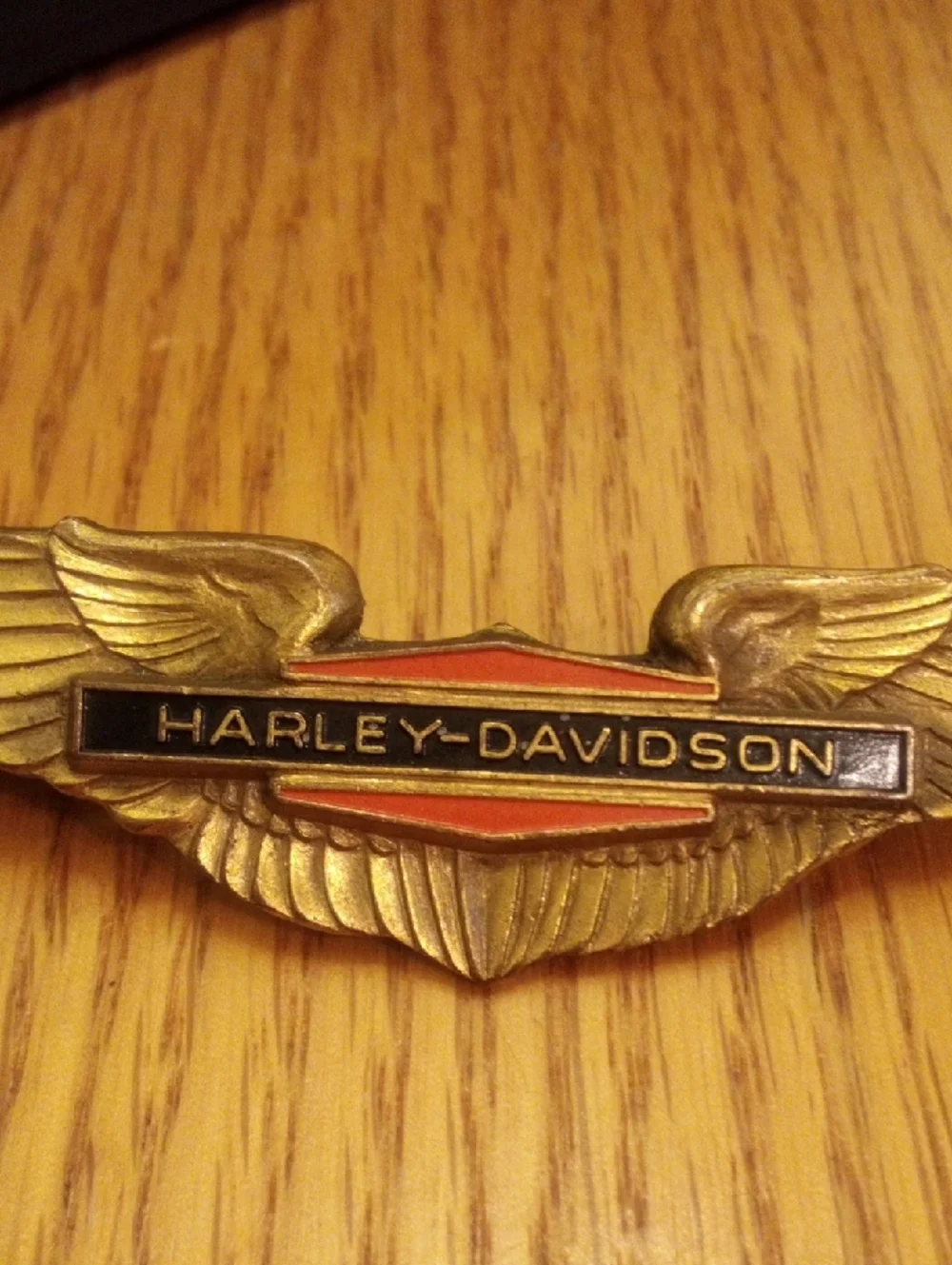 Harley-Davidson Gold Winged Logo Pin with Black and Red Accents